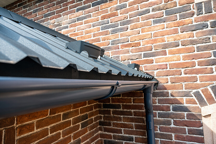 bigstock-Gutter-System-For-A-Metal-Ro-370893877.jpg