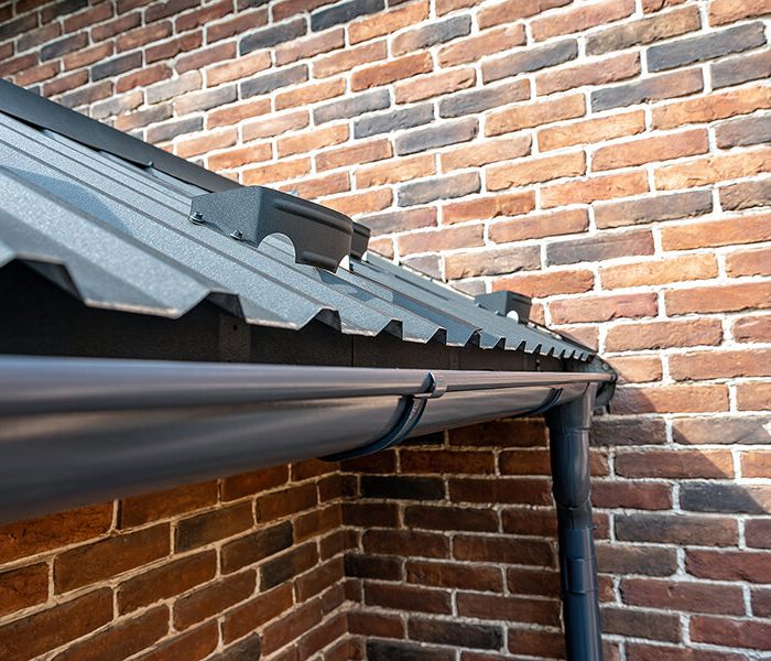 bigstock-Gutter-System-For-A-Metal-Ro-370893877.jpg
